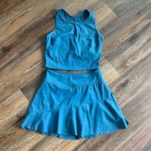 Size small. Blue golf/tennis outfit